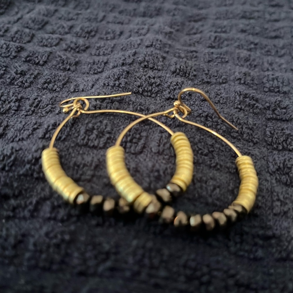 Never worn black and gold earrings